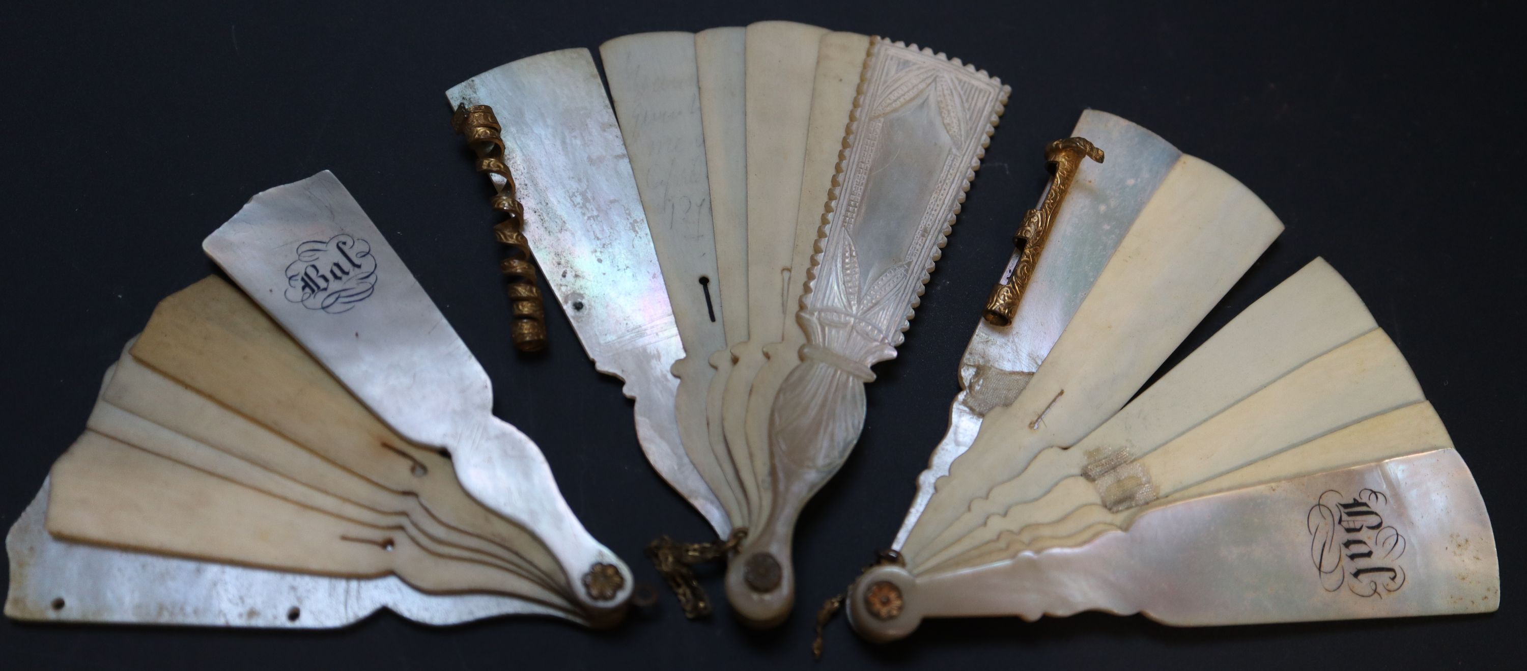 Six 19th century Palais Royale mother of pearl mounted dance cards and note cases largest 9cm